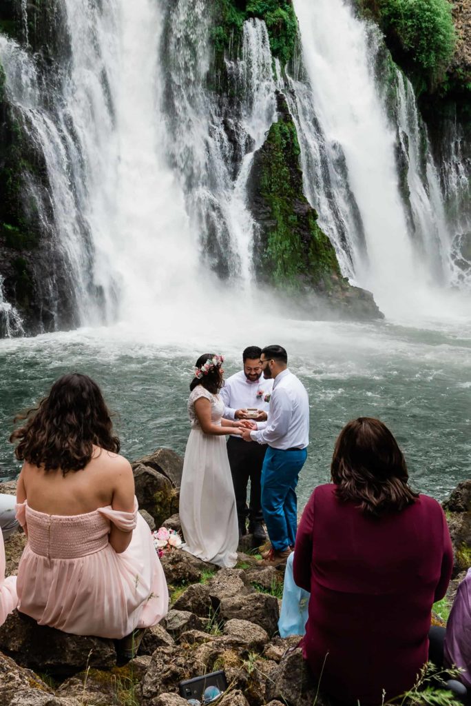 A state park with a rushing waterfall is a location that helped reduce the cost to elope for a couple