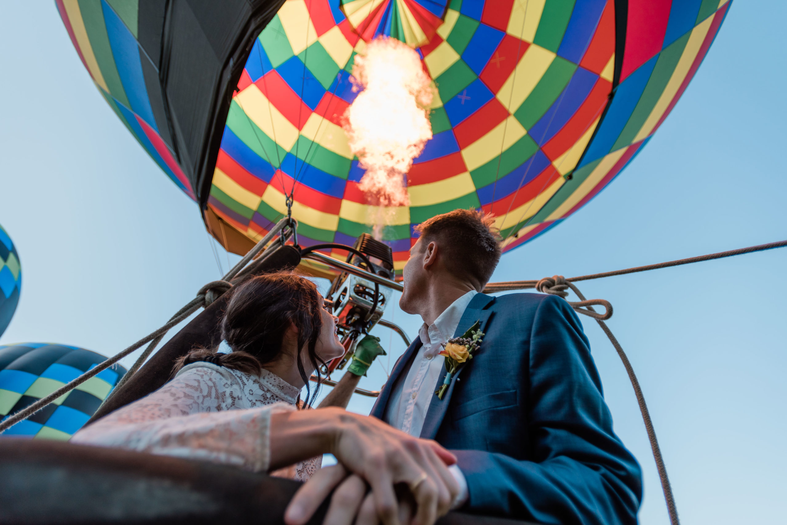 Wondering how much does an elopement cost? This bride and groom wanted a hot air balloon in their experience (as seen here!) That's an added cost!